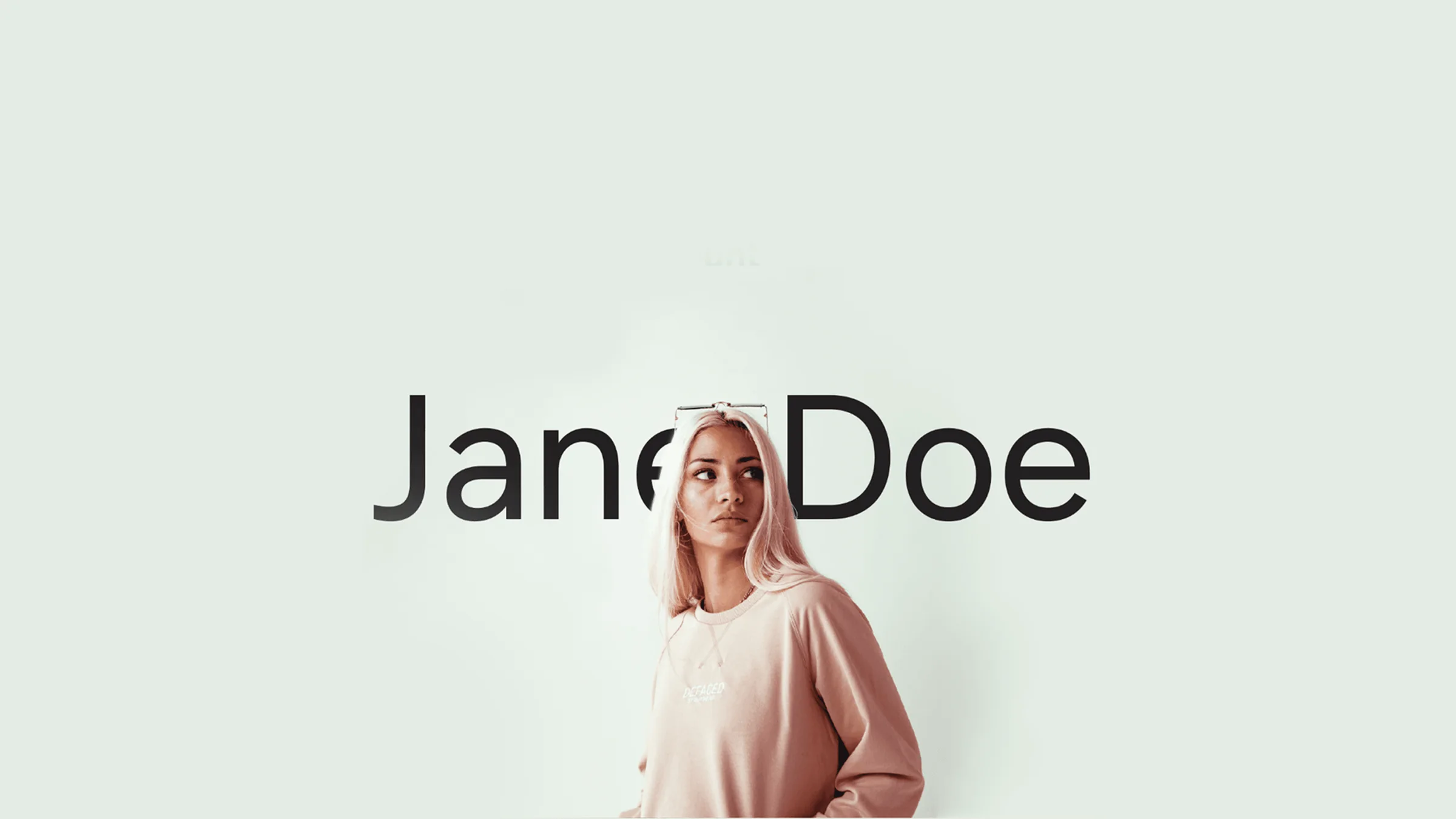 Jane Doe identity: name set in large type behind a portrait